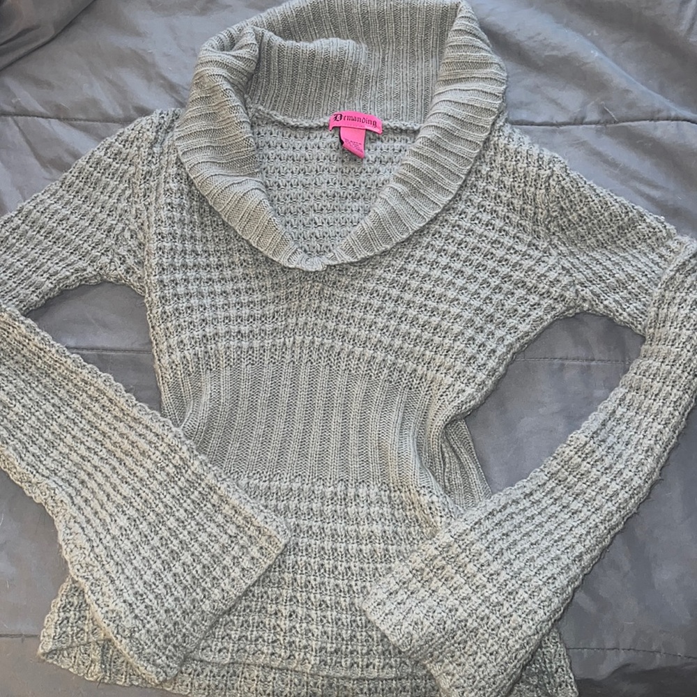 Gray sweater with flared sleeves